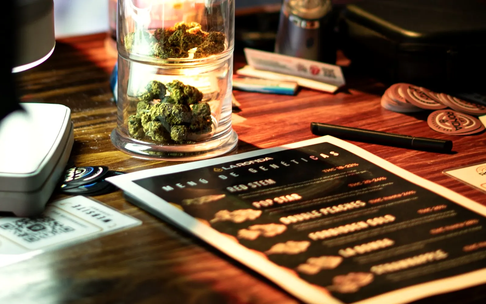 Cannabis displayed in glass on a dispensary counter